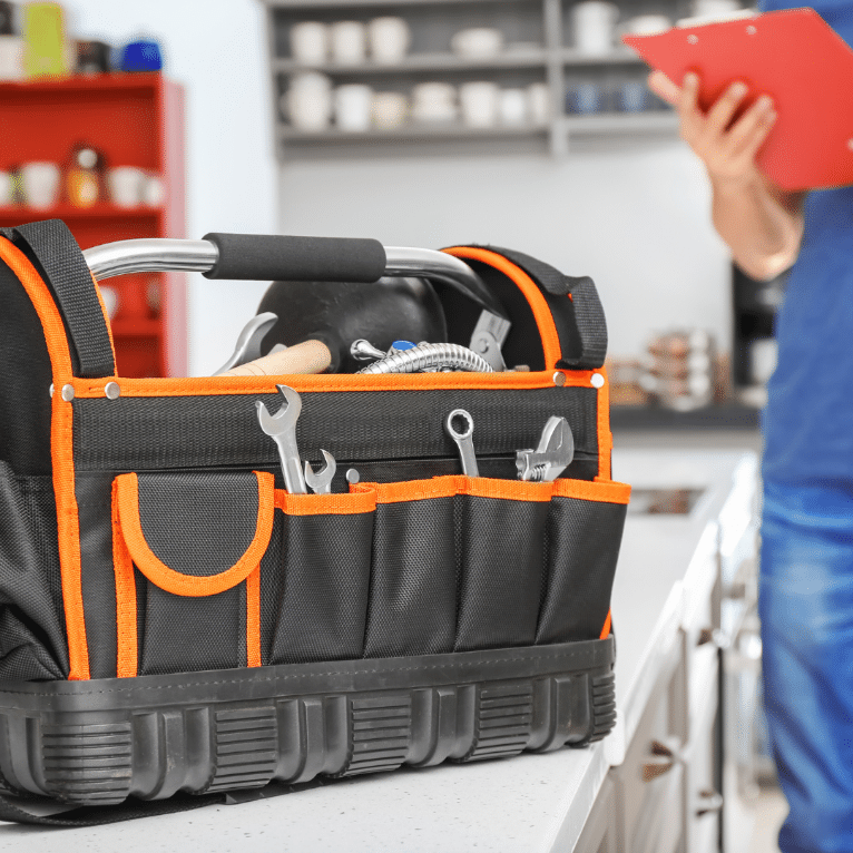 A tool bag with tools in it Description automatically generated